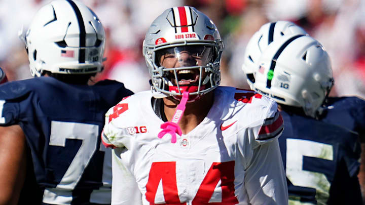 Ohio State Buckeyes defensive end JT Tuimoloau (44) celebrates a sack of Penn State Nittany Lions quarterback Drew Allar (15) during the second half of the NCAA football game at Beaver Stadium in University Park, Pa. on Saturday, Nov. 2, 2024. Ohio State won 20-13.