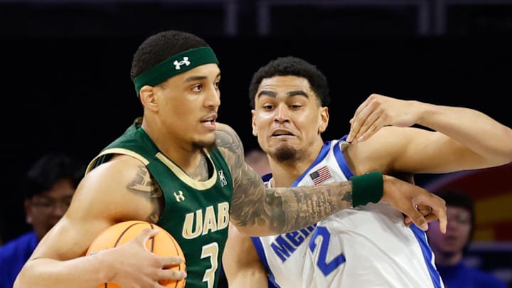 Mar 16, 2025; Fort Worth, TX, USA;  UAB Blazers forward Yaxel Lendeborg (3) drives to the basket as Memphis Tigers forward Nicholas Jourdain (2) defends during the first half at Dickies Arena. Mandatory Credit: Chris Jones-Imagn Images