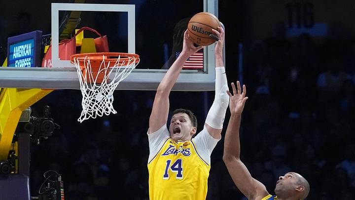 Oct 21, 2026; Los Angeles, California, USA; Los Angeles Lakers center Walker Kessler (14) reaches for the ball against Golden State Warriors center Al Horford (20) in the second half at Crypto.com Arena. Mandatory Credit: Kirby Lee-Imagn Images Oct 21, 2026; Los Angeles, California, USA; Los Angeles Lakers center Walker Kessler (14) reaches for the ball against Golden State Warriors center Al Horford (20) in the second half at Crypto.com Arena. Mandatory Credit: Kirby Lee-Imagn Images