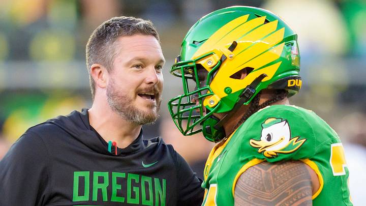 Sept. 18, 2026; Eugene, Oregon; Oregon Ducks coach Dan Lanning, talks to offensive lineman Dave Iuli prior to hosting the Portland State Vikings at Autzen Stadium. Sept. 18, 2026; Eugene, Oregon; Oregon Ducks coach Dan Lanning, talks to offensive lineman Dave Iuli prior to hosting the Portland State Vikings at Autzen Stadium.