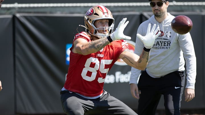 Jun 10, 2025; Santa Clara, CA, USA; San Francisco 49ers tight end George Kittle (85) works out with his teammates during an OTA at Levi's Stadium. Mandatory Credit: D. Ross Cameron-Imagn Images