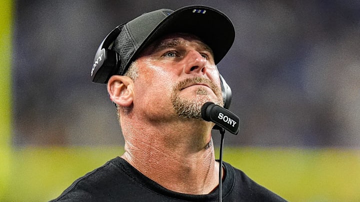Detroit Lions head coach Dan Campbell watches a replay against Houston Texans during the first half at Ford Field in Detroit on Saturday, August 23, 2025.