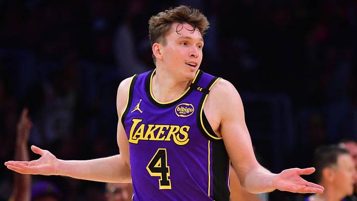 Los Angeles, California, USA; Los Angeles Lakers guard Dalton Knecht (4) react after scoring a three point basket against the Utah Jazz during the second half at Crypto.com Arena. Mandatory Credit: Gary A. Vasquez-Imagn Images Los Angeles, California, USA; Los Angeles Lakers guard Dalton Knecht (4) react after scoring a three point basket against the Utah Jazz during the second half at Crypto.com Arena. Mandatory Credit: Gary A. Vasquez-Imagn Images