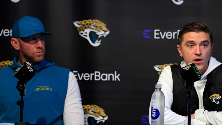 Jacksonville Jaguars general manager James Gladstone, right, speaks as head coach Liam Coen looks on during a press conference at the Miller Electric Center, Wednesday, Jan. 14, 2026, in Jacksonville, Fla.