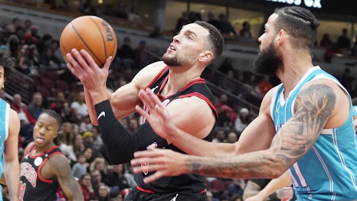 Jan 17, 2025; Chicago, Illinois, USA; Charlotte Hornets forward Cody Martin (11) defends Chicago Bulls guard Zach LaVine (8) during the first quarter at United Center. Mandatory Credit: David Banks-Imagn Images Jan 17, 2025; Chicago, Illinois, USA; Charlotte Hornets forward Cody Martin (11) defends Chicago Bulls guard Zach LaVine (8) during the first quarter at United Center. Mandatory Credit: David Banks-Imagn Images