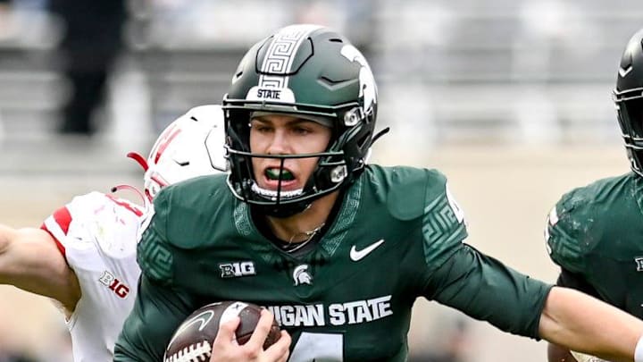 Michigan State's Sam Leavitt runs for a first down against Nebraska during the fourth quarter on Saturday, Nov. 4, 2023, at Spartan Stadium in East Lansing. Michigan State's Sam Leavitt runs for a first down against Nebraska during the fourth quarter on Saturday, Nov. 4, 2023, at Spartan Stadium in East Lansing.