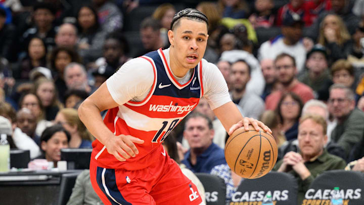 Mar 21, 2025; Washington, District of Columbia, USA; Washington Wizards forward Kyshawn George (18) drives to the basket during the third quarter at Capital One Arena. Mandatory Credit: Reggie Hildred-Imagn Images