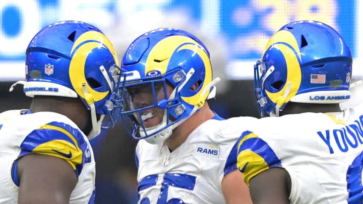 Sep 22, 2024; Inglewood, California, USA; Los Angeles Rams defensive tackle Braden Fiske (55), defensive tackle Kobie Turner (91) and linebacker Byron Young (0) celebrate after stopping San Francisco 49ers quarterback Brock Purdy (13) in the second half at SoFi Stadium. Mandatory Credit: Jayne Kamin-Oncea-Imagn Images Sep 22, 2024; Inglewood, California, USA; Los Angeles Rams defensive tackle Braden Fiske (55), defensive tackle Kobie Turner (91) and linebacker Byron Young (0) celebrate after stopping San Francisco 49ers quarterback Brock Purdy (13) in the second half at SoFi Stadium. Mandatory Credit: Jayne Kamin-Oncea-Imagn Images