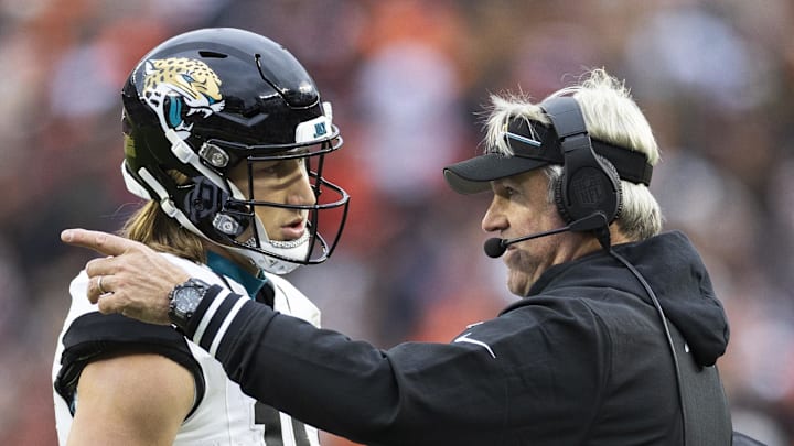 Dec 10, 2023; Cleveland, Ohio, USA; Jacksonville Jaguars head coach Doug Pederson talks with quarterback Trevor Lawrence (16) during the third quarter against the Cleveland Browns at Cleveland Browns Stadium. Mandatory Credit: Scott Galvin-Imagn Images