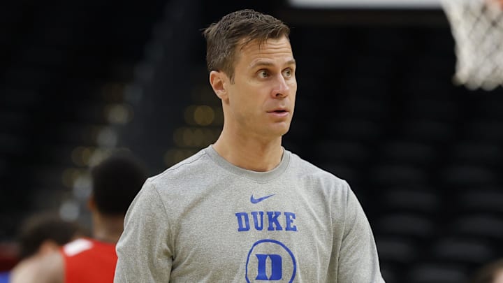 Mar 26, 2026; Washington, DC, USA; Duke Blue Devils head coach Jon Scheyer stands on the court during a practice session ahead of the east regional of the men's 2026 NCAA Tournament at Capital One Arena. Mandatory Credit: Geoff Burke-Imagn Images Mar 26, 2026; Washington, DC, USA; Duke Blue Devils head coach Jon Scheyer stands on the court during a practice session ahead of the east regional of the men's 2026 NCAA Tournament at Capital One Arena. Mandatory Credit: Geoff Burke-Imagn Images
