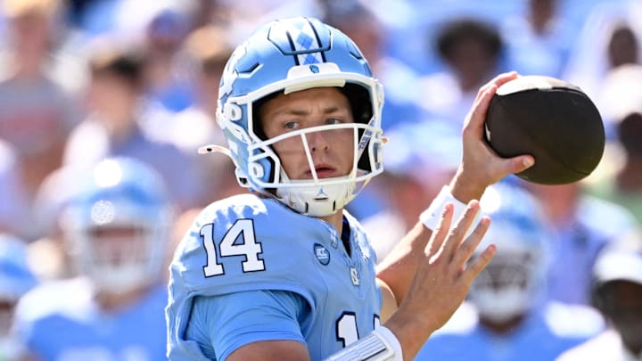 Oct 4, 2025; Chapel Hill, North Carolina, USA; North Carolina Tar Heels quarterback Max Johnson (14) looks to pass in the second quarter at Kenan Stadium. Mandatory Credit: Bob Donnan-Imagn Images