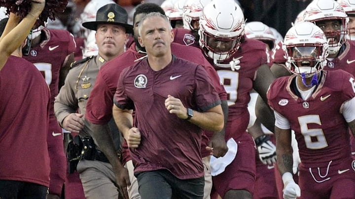 Sep 21, 2024; Tallahassee, Florida, USA; Florida State Seminoles head coach Mike Norvell leads his team out of the tunnel before the game against the California Golden Bears at Doak S. Campbell Stadium. Mandatory Credit: Melina Myers-Imagn Images