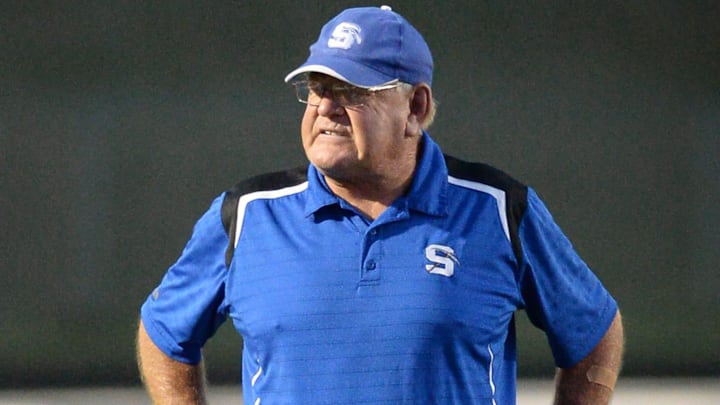 St. Mary's Springs head coach Bob Hyland stands on the field during halftime in a non-conference high school football season opener against Lake Country Lutheran on Friday, August 20, 2021, in Hartland, Wisconsin.
