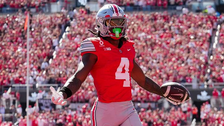 Ohio State Buckeyes wide receiver Jeremiah Smith (4) scores a touchdown during the NCAA football game against the Illinois Fighting Illini at Ohio Stadium in Columbus on Sept. 26, 2026. Ohio State Buckeyes wide receiver Jeremiah Smith (4) scores a touchdown during the NCAA football game against the Illinois Fighting Illini at Ohio Stadium in Columbus on Sept. 26, 2026.