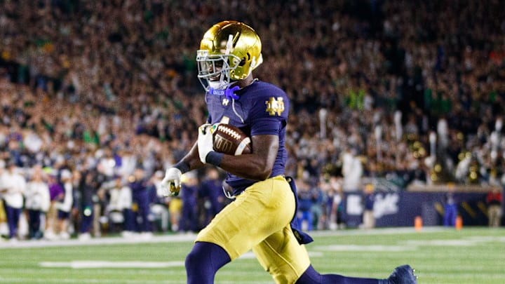 Notre Dame running back Jeremiyah Love (4) runs the ball into the end zone for a touchdown in the first half of a NCAA football game against Southern California at Notre Dame Stadium on Saturday, Oct. 18, 2025, in South Bend. Notre Dame running back Jeremiyah Love (4) runs the ball into the end zone for a touchdown in the first half of a NCAA football game against Southern California at Notre Dame Stadium on Saturday, Oct. 18, 2025, in South Bend.