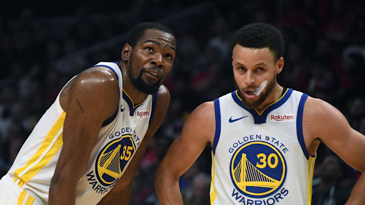 Apr 26, 2019; Los Angeles, CA, USA; Golden State Warriors guard Stephen Curry (30) and forward Kevin Durant (35) react in the first half of game six of the first round of the 2019 NBA Playoffs against the LA Clippers at Staples Center. Mandatory Credit: Kirby Lee-Imagn Images Apr 26, 2019; Los Angeles, CA, USA; Golden State Warriors guard Stephen Curry (30) and forward Kevin Durant (35) react in the first half of game six of the first round of the 2019 NBA Playoffs against the LA Clippers at Staples Center. Mandatory Credit: Kirby Lee-Imagn Images