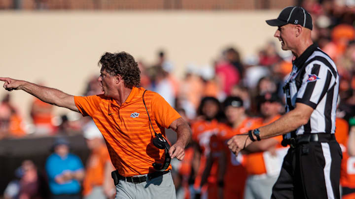 Sep 21, 2024; Stillwater, Oklahoma, USA; Oklahoma State Cowboys coach Mike Gundy reacts after a call during the fourth quarter against the Utah Utes at Boone Pickens Stadium. Mandatory Credit: William Purnell-Imagn Images