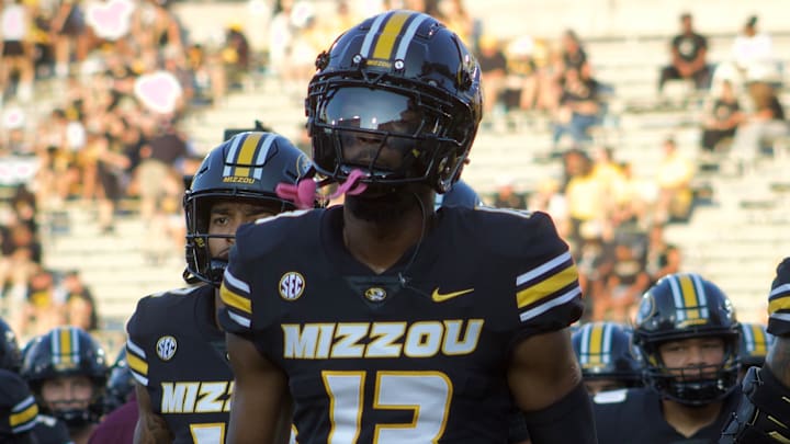 Aug 29, 2024; Columbia, Missouri, USA; Missouri Tigers defensive back Daylan Carnell (13) leads a group of his teammates back to the locker room prior to facing the Murray State Racers at Faurot Field. Aug 29, 2024; Columbia, Missouri, USA; Missouri Tigers defensive back Daylan Carnell (13) leads a group of his teammates back to the locker room prior to facing the Murray State Racers at Faurot Field.