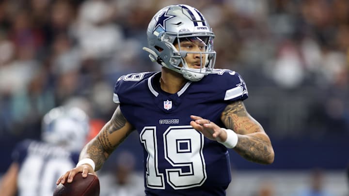Dallas Cowboys quarterback Trey Lance looks to throw a pass.