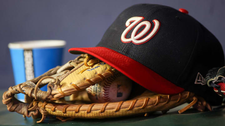 A detailed view of a Washington Nationals hat and glove