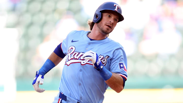 Sep 8, 2024; Arlington, Texas, USA; Texas Rangers center fielder Travis Jankowski (16) runs to third base in the eighth inning against the Los Angeles Angels  at Globe Life Field