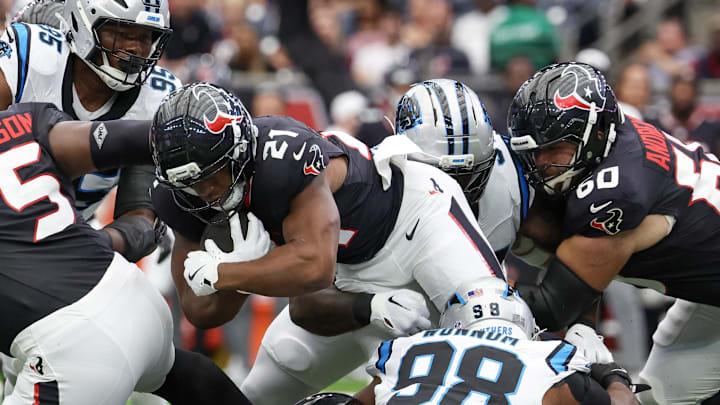 Aug 16, 2025; Houston, Texas, USA; Houston Texans running back Nick Chubb (21) rushes for two yards against the Carolina Panthers in the first quarter at NRG Stadium. Mandatory Credit: Thomas Shea-Imagn Images