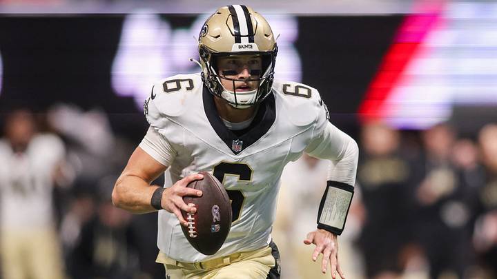New Orleans Saints quarterback Tyler Shough (6) runs for a touchdown against the Atlanta Falcons in the second quarter at Mercedes-Benz Stadium. New Orleans Saints quarterback Tyler Shough (6) runs for a touchdown against the Atlanta Falcons in the second quarter at Mercedes-Benz Stadium.