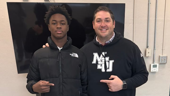 McComb wide receiver Sheldon Isaac with Mississippi State coach Jeff Lebby.