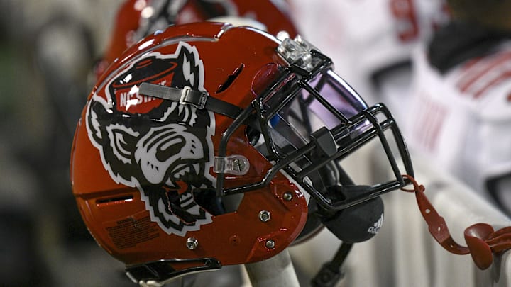 Nov 13, 2021; Winston-Salem, North Carolina, USA; A North Carolina State Wolfpack helmet seen on the sideline during the second half against the Wake Forest Demon Deacons at Truist Field. Mandatory Credit: William Howard-Imagn Images