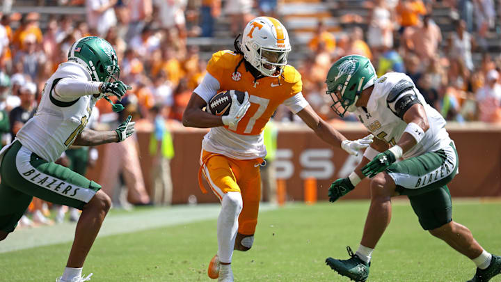 Sep 20, 2025; Knoxville, Tennessee, USA;  Tennessee Volunteers wide receiver Chris Brazzell II (17) runs the ball against the UAB Blazers during the second half at Neyland Stadium. Mandatory Credit: Randy Sartin-Imagn Images