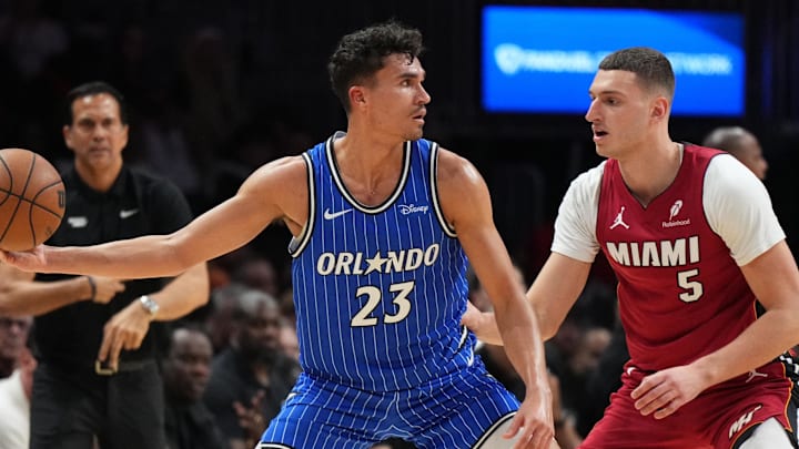 Jan 28, 2026; Miami, Florida, USA;  Orlando Magic forward Tristan da Silva (23) looks to pass the ball as Miami Heat forward Nikola Jovic (5) defends during the second half at Kaseya Center. Mandatory Credit: Jim Rassol-Imagn Images