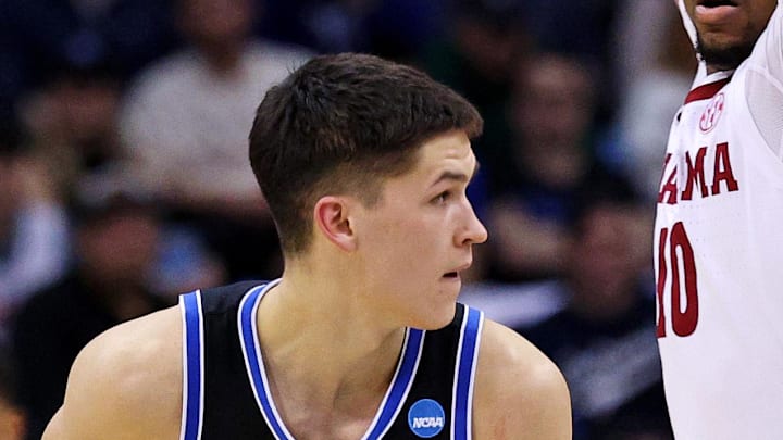 Mar 27, 2025; Newark, NJ, USA; Brigham Young Cougars guard Egor Demin (3) handles the ball against Alabama Crimson Tide forward Mouhamed Dioubate (10) during the second half during an East Regional semifinal of the 2025 NCAA tournament at Prudential Center. Mandatory Credit: Vincent Carchietta-Imagn Images