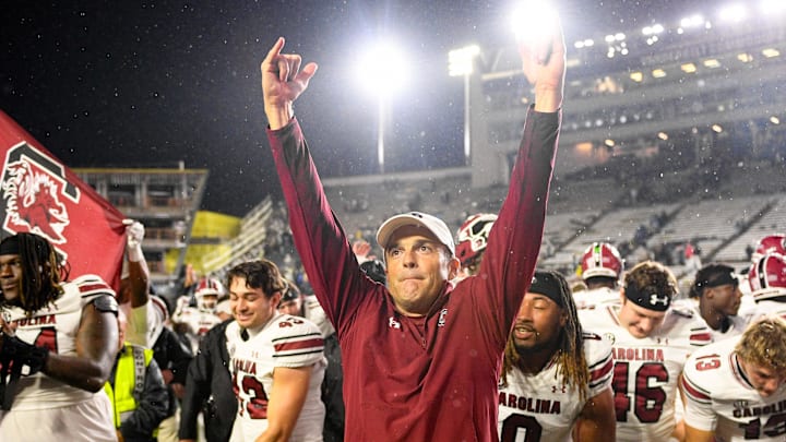 Nov 9, 2024; Nashville, Tennessee; South Carolina Gamecocks head coach Shane Beamer and his team celebrate the win with their fans against the Vanderbilt Commodores during the second half at FirstBank Stadium. 