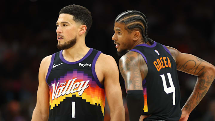 Apr 7, 2026; Phoenix, Arizona, USA; Phoenix Suns guard Devin Booker (1) and Jalen Green (4) against the Houston Rockets in the second half at Mortgage Matchup Center. Mandatory Credit: Mark J. Rebilas-Imagn Images
