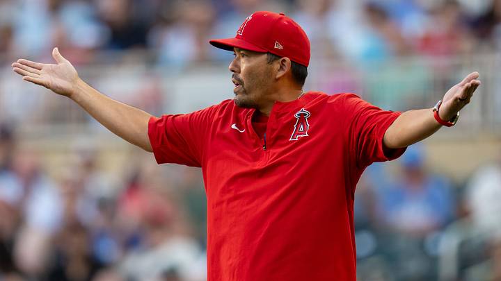 Los Angeles Angels head coach Kurt Suzuki throws his arms up Los Angeles Angels head coach Kurt Suzuki throws his arms up