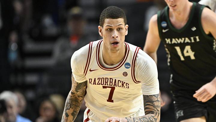Mar 19, 2026; Portland, OR, USA; Arkansas Razorbacks forward Trevon Brazile (7) dribbles in the second half against the Hawaii Rainbow Warriors during a first round game of the men's 2026 NCAA Tournament at Moda Center. Mandatory Credit: Craig Strobeck-Imagn Images