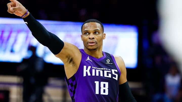 Jan 16, 2026; Sacramento, California, USA; Sacramento Kings guard Russell Westbrook (18) points to the bench during the fourth quarter against the Washington Wizards at Golden 1 Center.