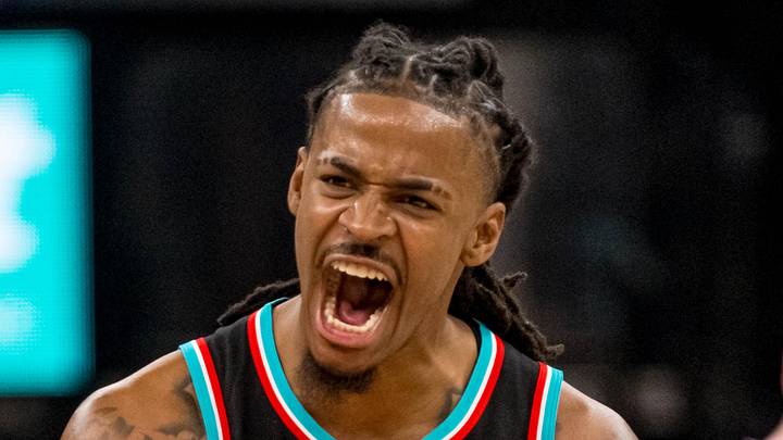 Memphis Grizzlies point guard Ja Morant (12) celebrates after making a three-pointer in the second half against the Utah Jazz at FedExForum on December 12, 2025.
