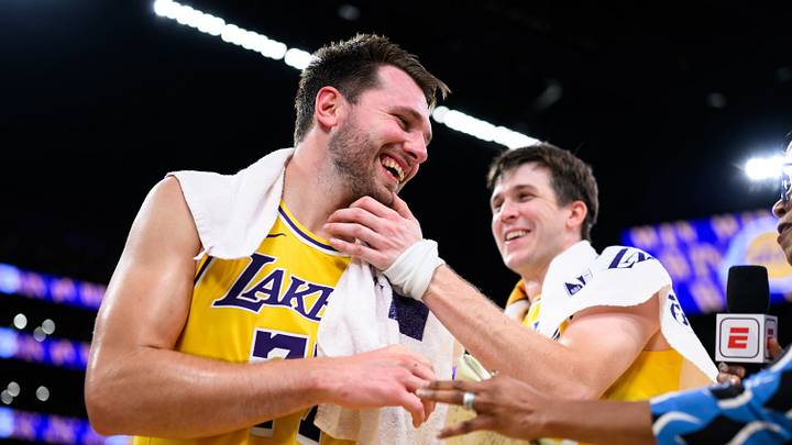 Mar 14, 2026; Los Angeles, California, USA; Los Angeles Lakers guard Luka Doncic (77) reacts with guard Austin Reaves (15) after scoring a game-winning shot during overtime against the Denver Nuggets at Crypto.com Arena. Mandatory Credit: William Liang-Imagn Images Mar 14, 2026; Los Angeles, California, USA; Los Angeles Lakers guard Luka Doncic (77) reacts with guard Austin Reaves (15) after scoring a game-winning shot during overtime against the Denver Nuggets at Crypto.com Arena. Mandatory Credit: William Liang-Imagn Images