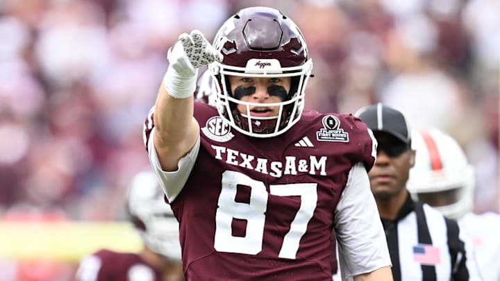 Dec 20, 2025; College Station, TX, USA; Texas A&M Aggies tight end Nate Boerkircher (87) celebrates a first down against the Miami Hurricanes during first quarter of the first round game of the CFP National Playoff at Kyle Field. 