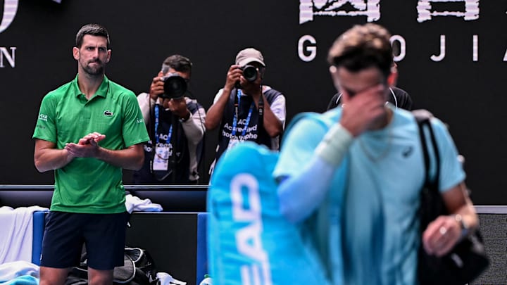 Novak Djokovic at the Australian Open watches Lorenzo Musetti