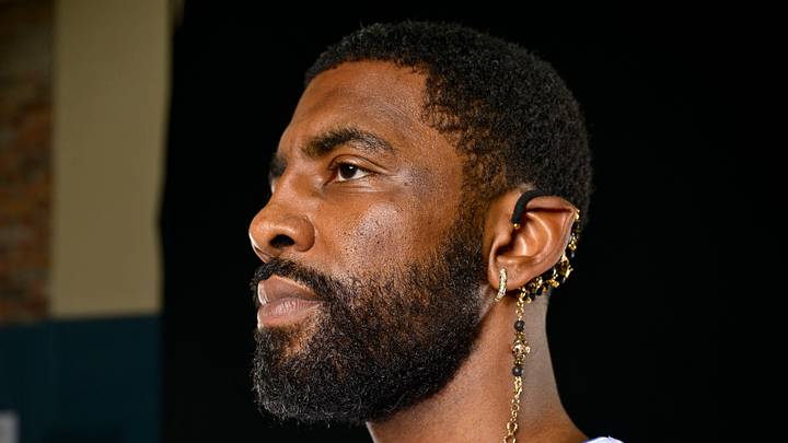 Kyrie Irving poses for a photo during the Mavericks media day. Kyrie Irving poses for a photo during the Mavericks media day.