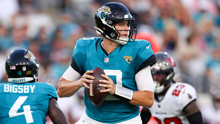 Aug 17, 2024; Jacksonville, Florida, USA; Jacksonville Jaguars quarterback Mac Jones (10) drops back to pass against the Tampa Bay Buccaneers in the first quarter during a preseason game at EverBank Stadium. Mandatory Credit: Nathan Ray Seebeck-USA TODAY Sports