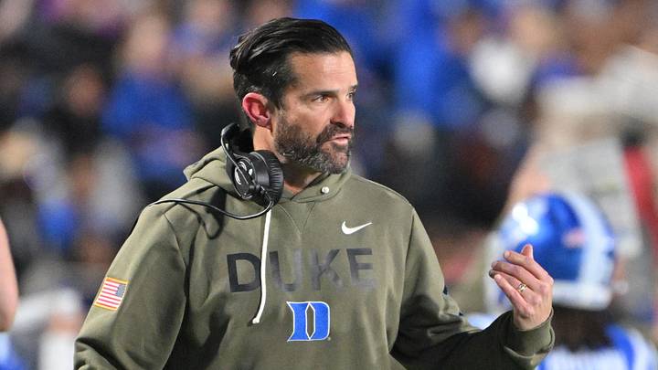 Nov 15, 2025; Durham, North Carolina, USA; Duke Blue Devils head coach Manny Diaz reacts during the third quarter against the Virginia Cavaliers at Wallace Wade Stadium. Mandatory Credit: Zachary Taft-Imagn Images Nov 15, 2025; Durham, North Carolina, USA; Duke Blue Devils head coach Manny Diaz reacts during the third quarter against the Virginia Cavaliers at Wallace Wade Stadium. Mandatory Credit: Zachary Taft-Imagn Images