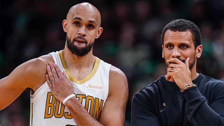 Dec 19, 2025; Boston, Massachusetts, USA; Boston Celtics head coach Joe Mazzulla talks with guard Derrick White (9) from the sideline as they take on the Miami Heat at TD Garden. Mandatory Credit: David Butler II-Imagn Images