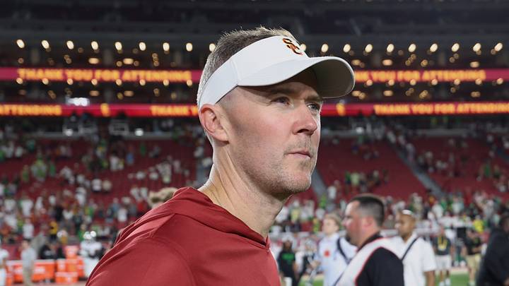 Sep 26, 2026; Los Angeles, California, USA;  USC Trojans head coach Lincoln Riley walks off the field after the game against the Oregon Ducks at United Airlines Field at Los Angeles Memorial Coliseum. 