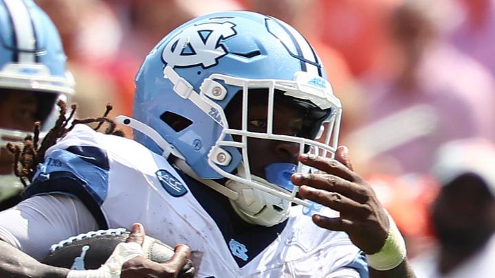 Sep 19, 2026; Clemson, South Carolina, USA; University of North Carolina Tar Heels running back Demon June (0) runs the ball down field late in the first quarter against the North Carolina Tar Heels at Memorial Stadium. Mandatory Credit: Ashley Tumlin-Imagn Images Sep 19, 2026; Clemson, South Carolina, USA; University of North Carolina Tar Heels running back Demon June (0) runs the ball down field late in the first quarter against the North Carolina Tar Heels at Memorial Stadium. Mandatory Credit: Ashley Tumlin-Imagn Images
