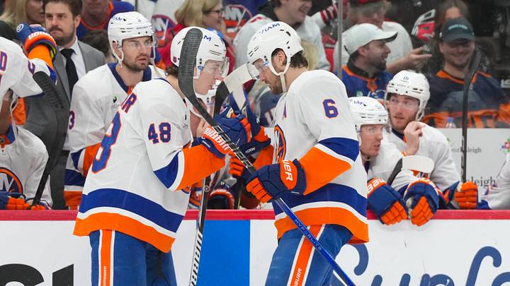 Apr 4, 2026; Raleigh, North Carolina, USA; New York Islanders defenseman Matthew Schaefer (48) and defenseman Ryan Pulock (6) get ready for the start of the game against the Carolina Hurricanes at Lenovo Center. Mandatory Credit: James Guillory-Imagn Images Apr 4, 2026; Raleigh, North Carolina, USA; New York Islanders defenseman Matthew Schaefer (48) and defenseman Ryan Pulock (6) get ready for the start of the game against the Carolina Hurricanes at Lenovo Center. Mandatory Credit: James Guillory-Imagn Images