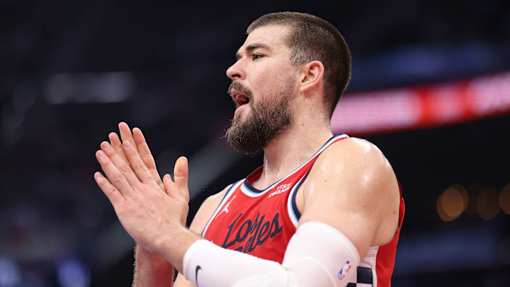 Ivica Zubac clasps his hands together