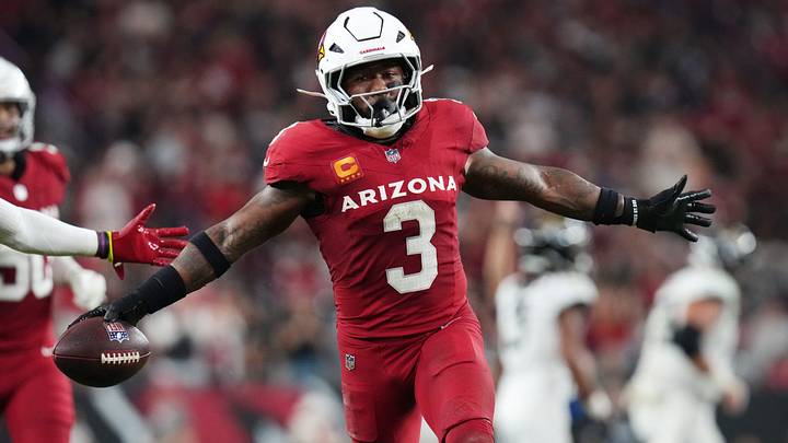Arizona Cardinals safety Budda Baker (3) celebrates his interception against the Jacksonville Jaguars at State Farm Stadium on Nov. 23, 2025. Arizona Cardinals safety Budda Baker (3) celebrates his interception against the Jacksonville Jaguars at State Farm Stadium on Nov. 23, 2025.